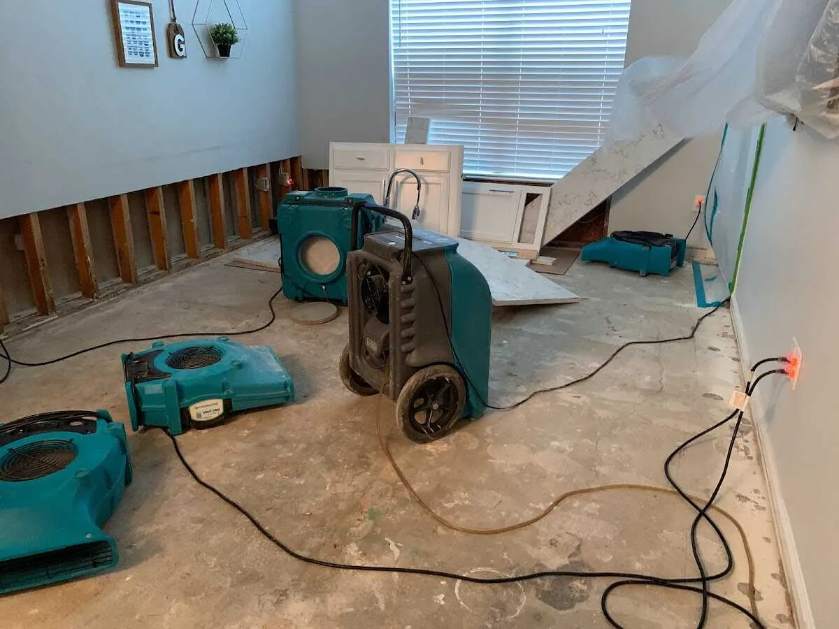 Dehumidifier in flood-cut room for Water Damage Restoration in Kenmore